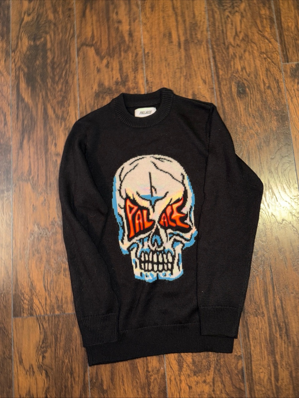 PALACE Black Crewneck Sweater with Skull Graphic and Blue-Trim